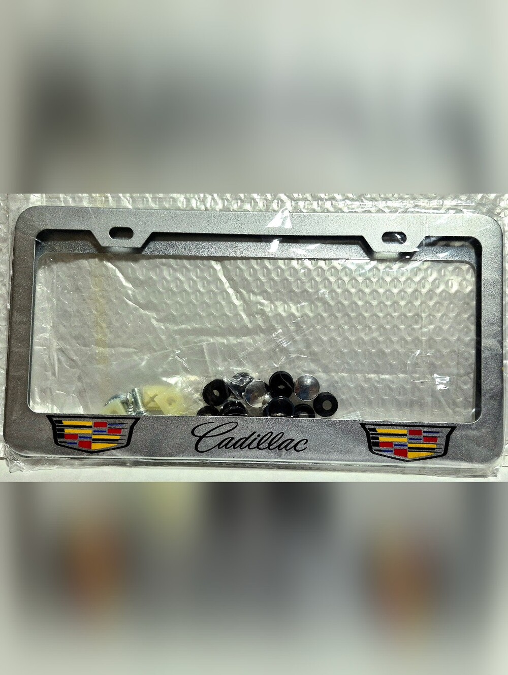 Cadillac Silver License Plate Frame with Crest Accents